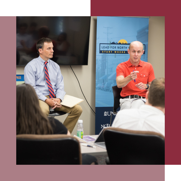 Two panelists speaking at a Lead for North Carolina event.