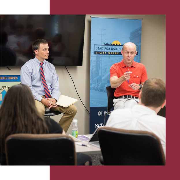 Two panelists speaking at a Lead for North Carolina event.