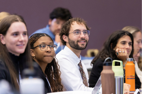 Students engaged in a discussion during a law class.